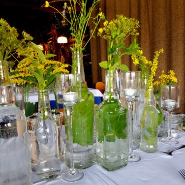 Glass Bottles with Yellow Flowers & Leaves