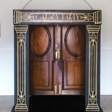 Gatsby Arch with Black Carpet Runner