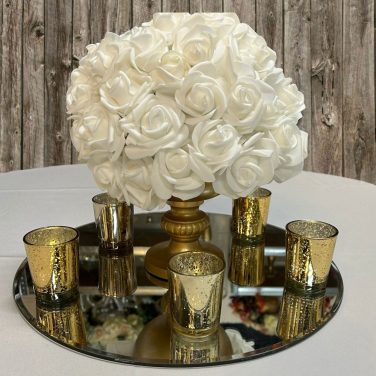 White Roses in Gold Punch bowl on 40cm mirror with Gold crackle tea light holders and LED tea Lights
