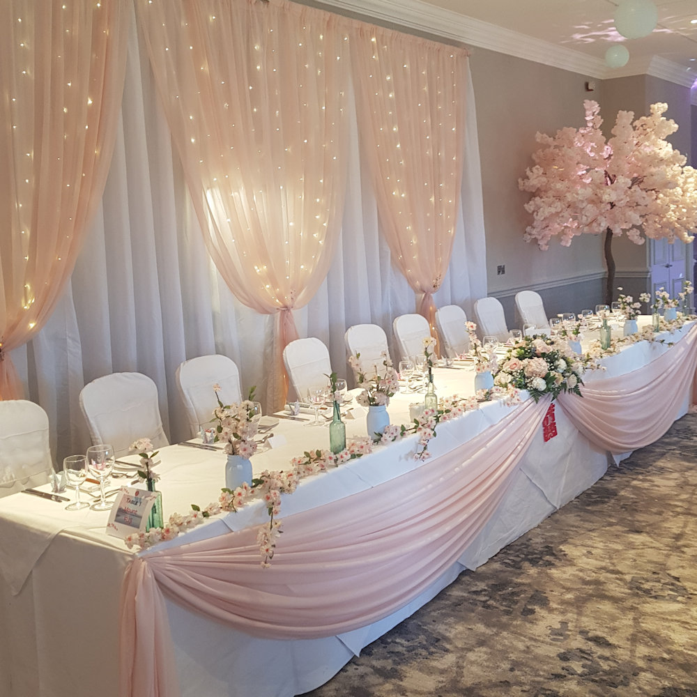 Hanbury manor pink blossom trees rustic and floor standing white aisle carpet poles hall (16)