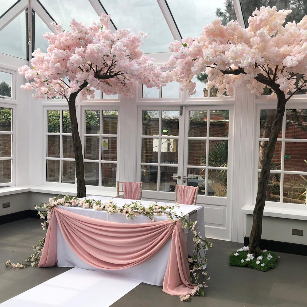 Hunton new hazelwood pink blossom trees vertical chair drape rose gold candleabra hurricane tops swags garland (3)