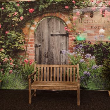 Secret Garden Backdrop with Bench Swing Plants Hunton Park