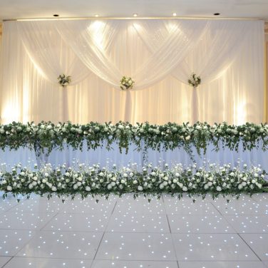 Top Table with messy flower runner & floor runner