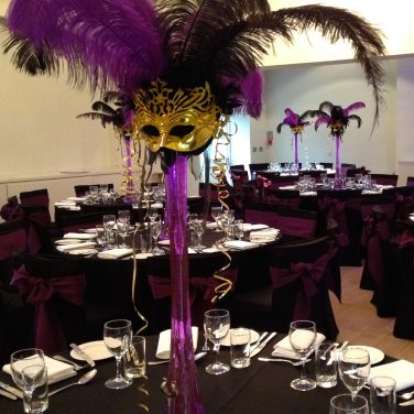 Feather Mask Centrepiece on Lily Vase and Mirror with Light