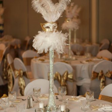 Lilly vase mask centrepiece and feathers gold and white