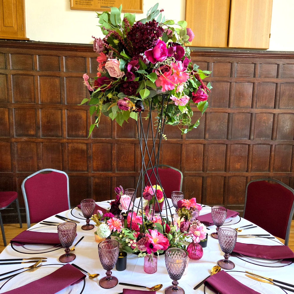 Black Twisted Metal Stand 80cm with Raspberry Flowers Hire