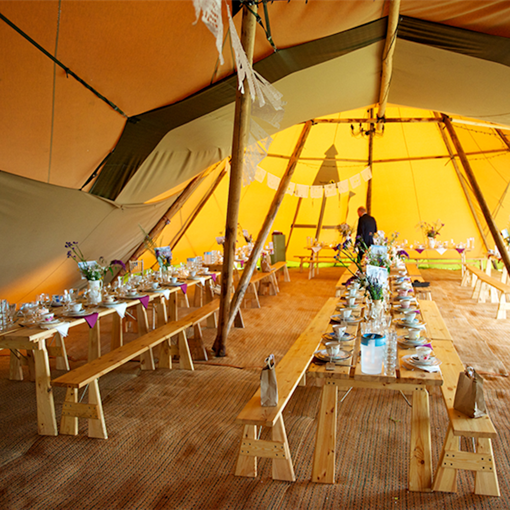 Pine Tables & Benches in a Tipi